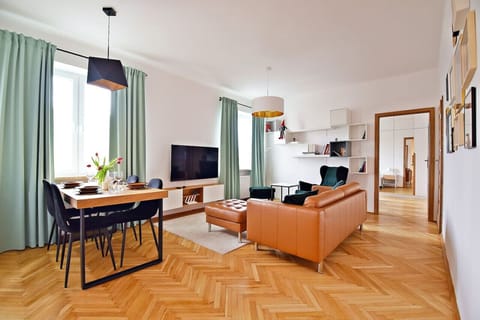 Comfortable Living Room with Sofa Bed and Smart TV | Book Now with RENTUJEMY
