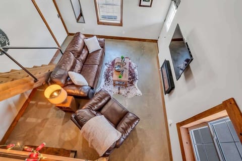 Elevated loft view of the spacious living area.