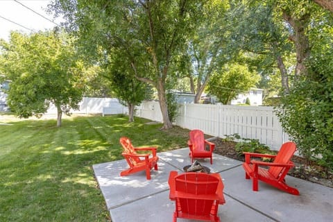 Relaxing Patio with seating and a outdoor fire pit
