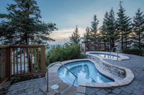 Welcome to Rimfire Lodge 145, where comfort meets convenience in the center of The Village at Snowshoe!  Enjoy the outdoor hot tub with mountain views that's available to all Rimfire Guests!