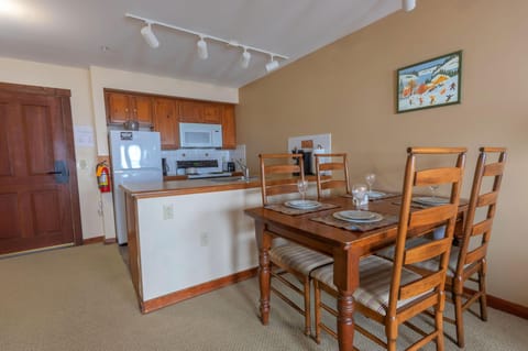 The table sits four people and is a great place to enjoy your meals.