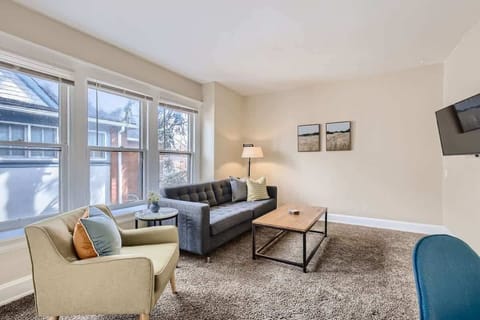 Large and spacious living area with smart TV and lots of seating