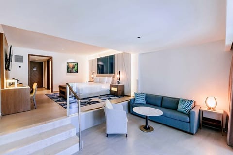 Stretch out in your spacious suite with a cozy lounge corner.