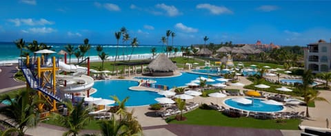 Escape to a beachfront pool paradise with endless ocean views.