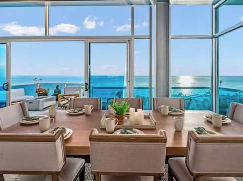 Imagine starting your day with breakfast at this table, surrounded by endless ocean views and the sound of waves gently crashing outside. Sunlight pours in, creating the perfect ambiance as conversations flow, and life feels like a slice of paradise.