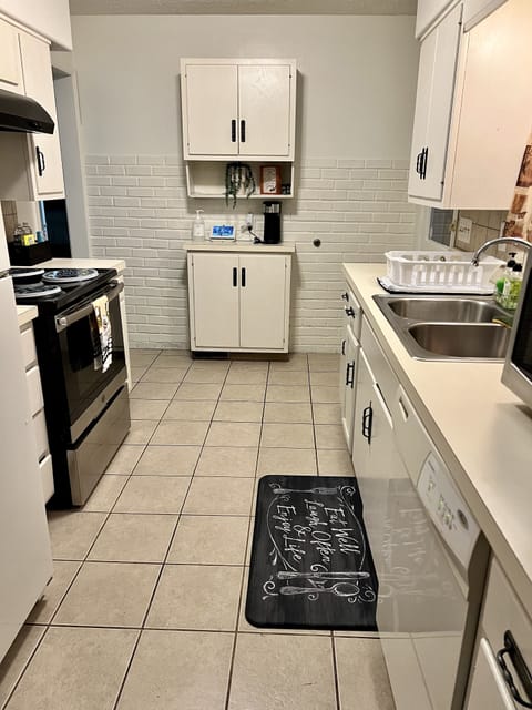 Walk through kitchen with appliances