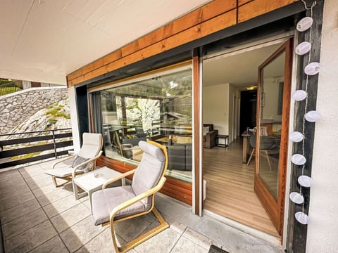 Furniture, Building, Chair, Wood, Interior Design, Floor, Flooring, Living Room, Shade, Armrest