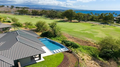 Stunning 5 bedroom home 400 yards from the ocean overlooking Hapuna golf course.