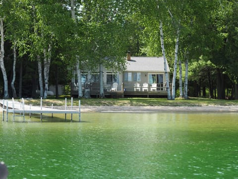 OVERALL:  Beautiful Big Platte Lake with the cottage, private lakefront, and private dock in the background.