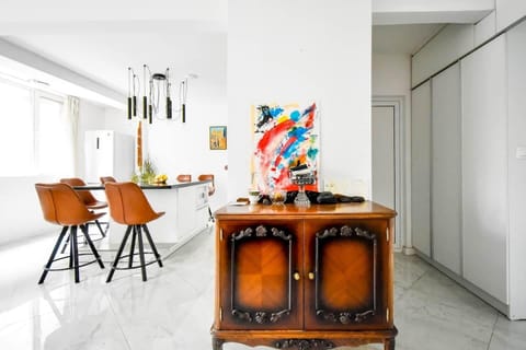 Luminous and airy living room with a welcoming couch and tasteful, minimalist décor.