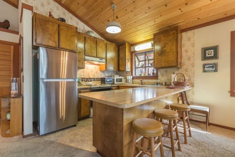 Nicely appointed kitchen with island bar seating.
