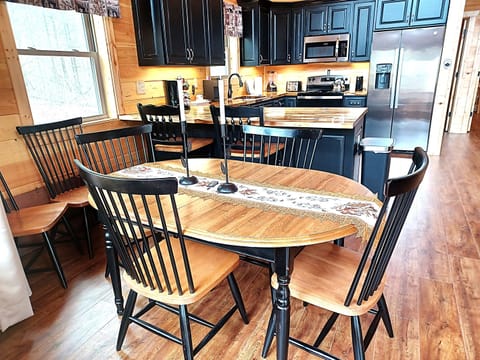 Dining Table with Remote-Controlled Candlesticks
