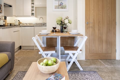 Ground floor: Foldable dining table seating two guests