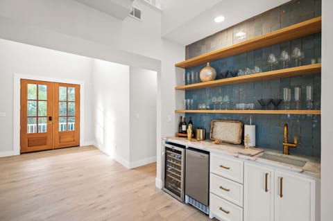 Wine Fridge, Ice Maker and Sink at Wet Bar