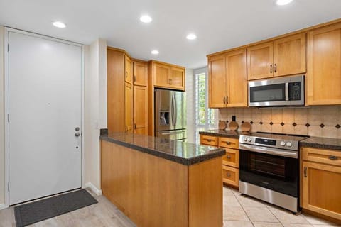 A fully equipped kitchen with all modern amenities, perfect for preparing delicious meals.