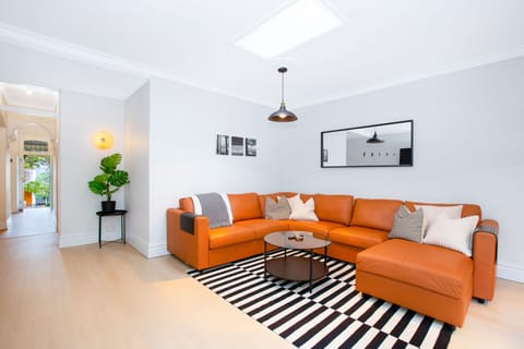 Brand new leather sofa with storage built into the chaise section