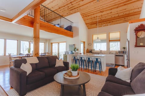 The cozy loft area overlooks the kitchen and living room, creating a spacious, airy vibe.