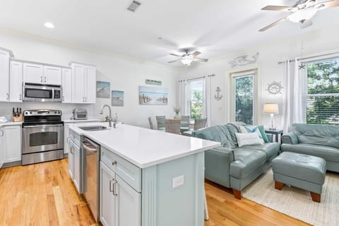 Second floor main living space: kitchen, living, and dining area
