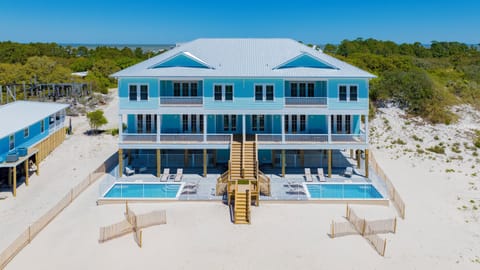 Summertime Blues is a 12 bedroom/6 bathroom/2 half bath "whole" duplex