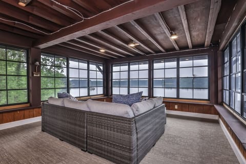 Beautiful open screened in porch area over looking the lake