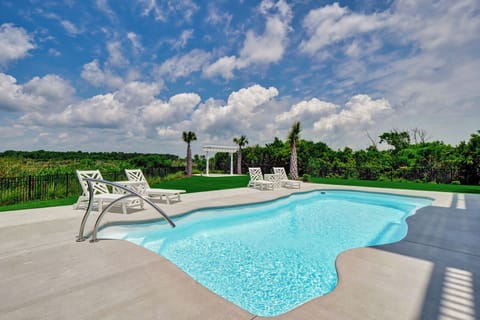 Soak up the sun by the private outdoor pool at Sea Haven