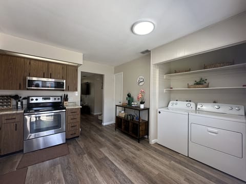 Stainless Steel appliances, Coffee Station, cookware, and more amenities.