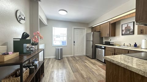 Stainless Steel appliances, Coffee Station, cookware, and more amenities.
