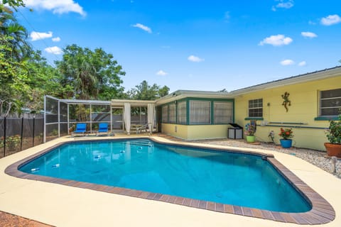 Heated saltwater pool to swim or float in privacy.