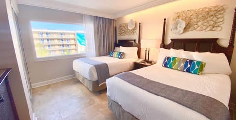 Unit with 2 Double size beds. Exact unit will be assigned upon arrival. Views, colors and decor may vary.