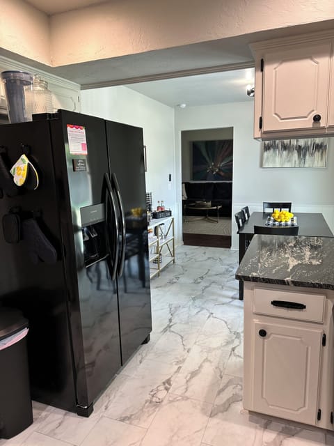 French door refrigerator/freezer with water and ice.