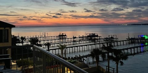 The best seat in the house is your balcony at sunset.