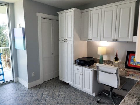 A small office space for work between beach days, if you must.  Also has a queen size Murphey bed in this room.