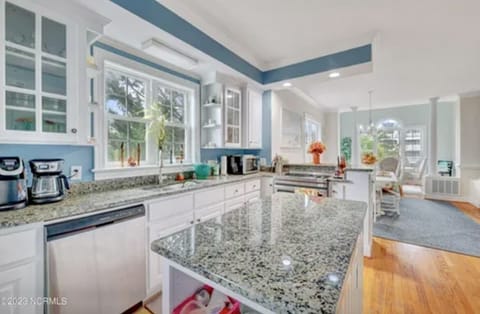 Kitchen overlooking dining areas