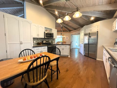 Kitchen with eat in space and adjacent to dining area