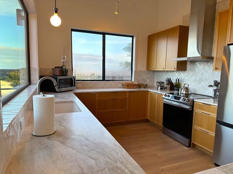 Cooking is fun while looking out at sweeping ocean views.