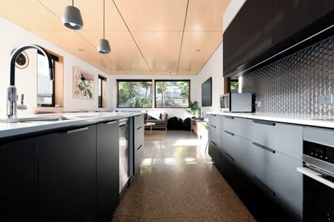 Well-appointed kitchen filled with modern appliances