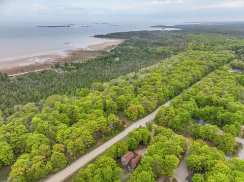 Enjoy the convenience of being close to the stunning shoreline, perfect for beach walks and water activities, with scenic views of the surrounding islands.