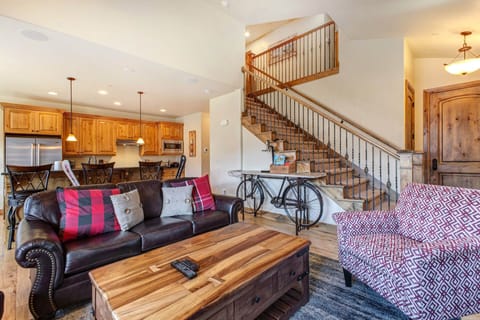 Cozy sofa with center table, perfect for chats by the fireplace