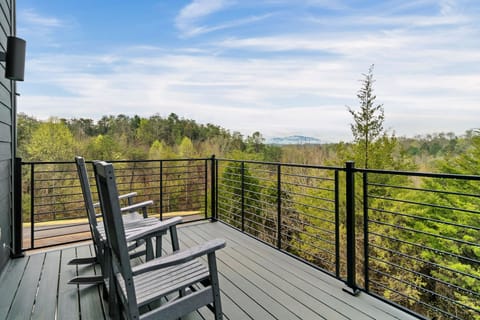 Balcony with great view and outdoor furniture.