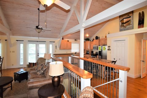 Stairs going down to second floor.