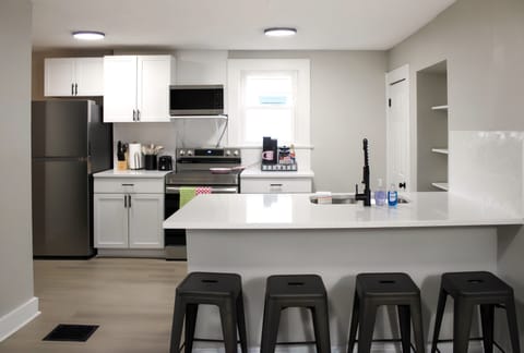 Kitchen with an island for more seating.