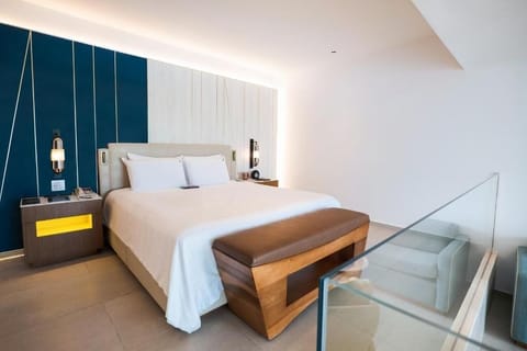 Enjoy a spa-like bathroom with sleek finishes and plush robes.