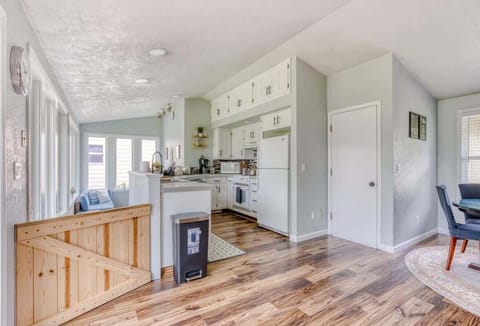 Flow easily between the bright kitchen and cozy nooks. Enjoy seamless living during your elevated Cascadia Getaway!