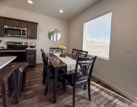 Bright and welcoming dining space with natural light, and a cozy setup perfect for meals and meaningful conversations.