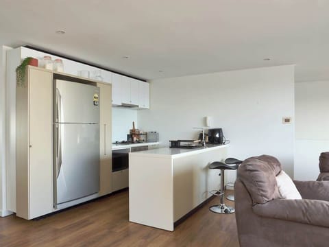 Fully equipped kitchen with all essentials and more supplied for guests.