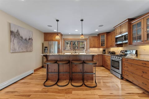 Breakfast bar with additional seating for four.