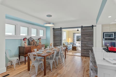 Large modern farmhouse dining table designed for gathering everyone together.