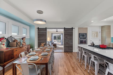 Breakfast bar offers a cozy spot to chat while meals come together.