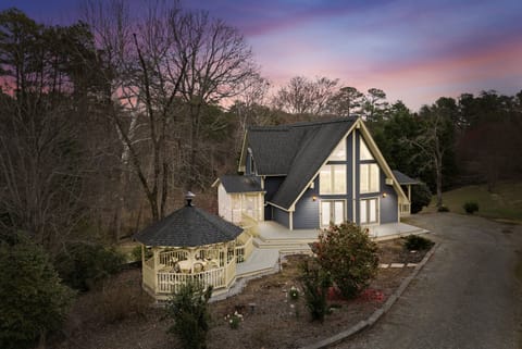 Beautiful A-Frame design with gazebo and screened porch for outdoor enjoyment.