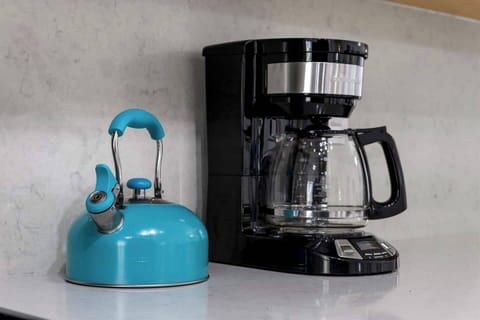 Start your day with our handy tea kettle and coffee pot. We’ve provided coffee and sugar to kick off your morning routine.